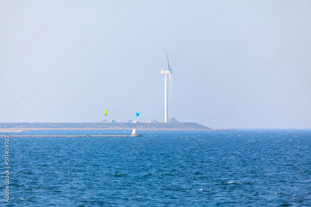 Fototapeta premium Offshore wind turbine . Wind mill in the sea . Renewable energy source