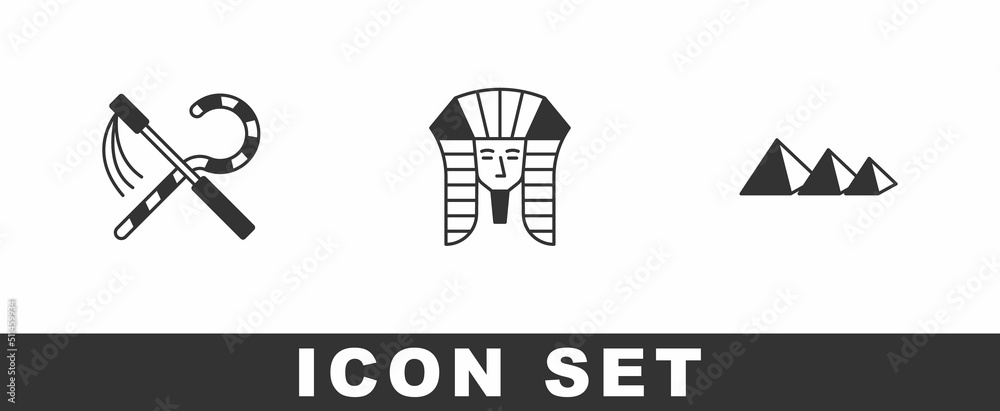 Fototapeta premium Set Crook and flail, Egyptian pharaoh and pyramids icon. Vector