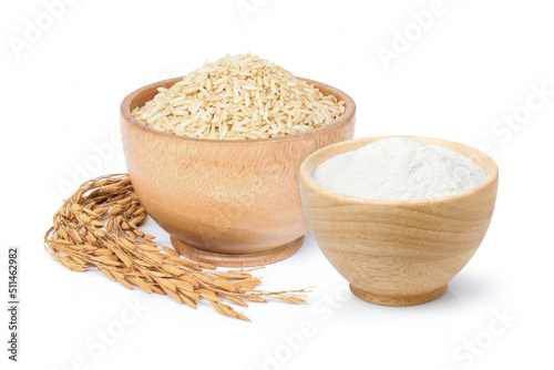 White rice flour and brown rice in wooden bowl isolated on white background.