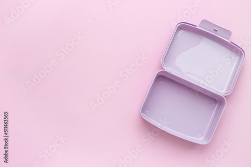 Empty purple lunch boxes, top view. Plastic container for food