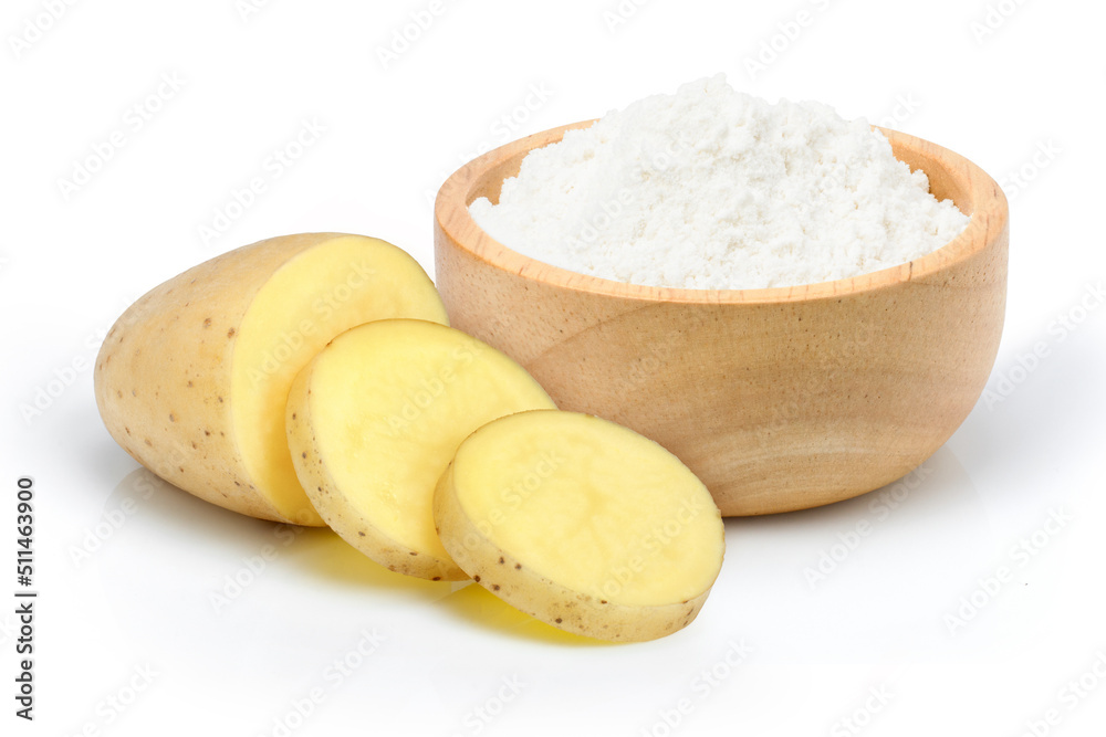 Potato ground in wooden bowl and raw potatoes with slices isolated on white background. Potato ground in wooden bowl and raw potatoes with slices isolated on white background.