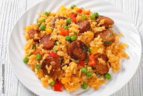 fried  sausages with rice and vegetables, top view