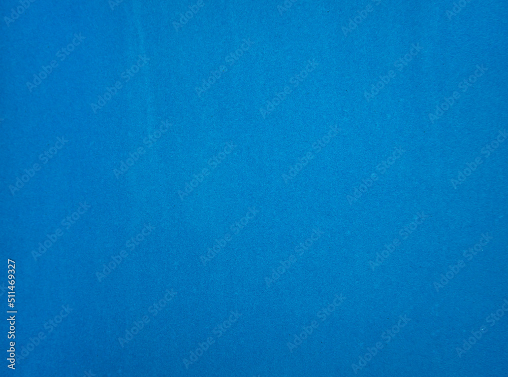 Blue felt fabric close-up. Abstract background. The texture of the fibers. Velvet surface.