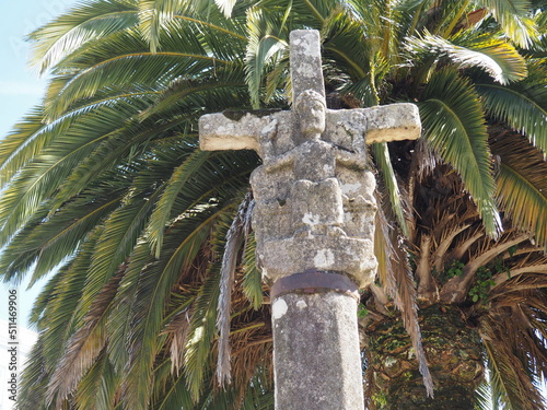 cruz del siglo catorce representando a jesus resucitado triunfando a la muerte, ciñe su cabeza una corona real, sentado mostrando las llagas de la pasion, mellid, la coruña, europa photo