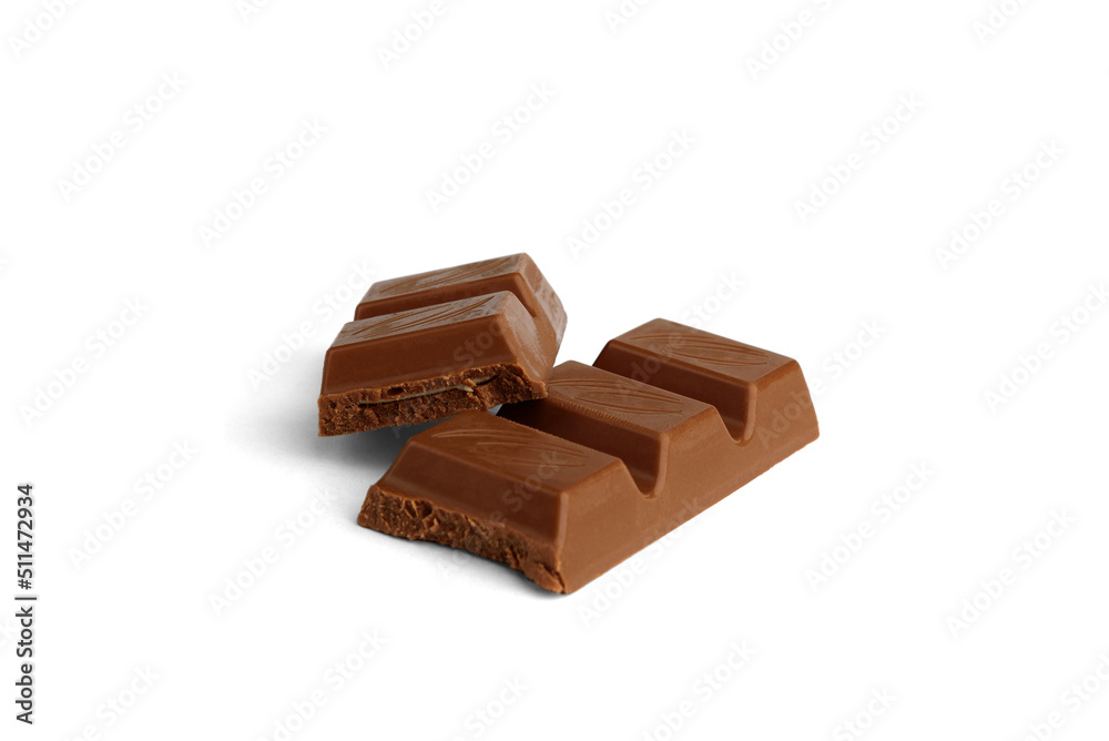 Fototapeta premium Chocolate pieces with milk filling isolated on white background.