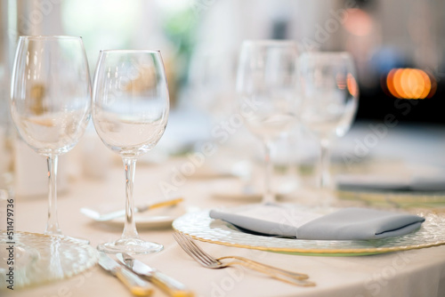 Catering services. glasses set and dishes plates in restaurant