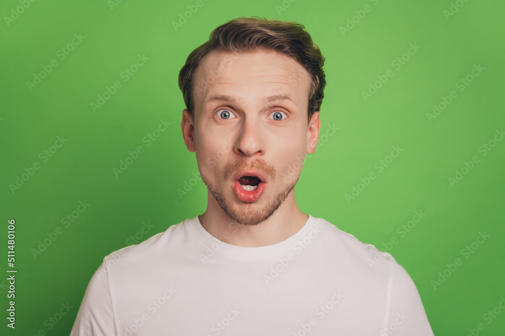 Excited shocked crazy funny blond man open mouth omg sale discount reaction isolated on green color background Excited shocked crazy funny blond man open mouth omg sale discount reaction isolated on green color background