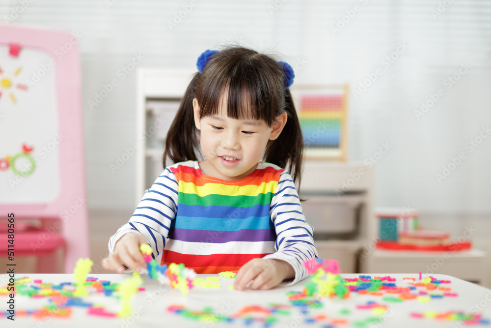 young girl playing creative blocks for homeschooling young girl playing creative blocks for homeschooling