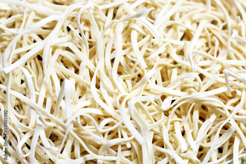 Homemade noodles for soup, background, top view