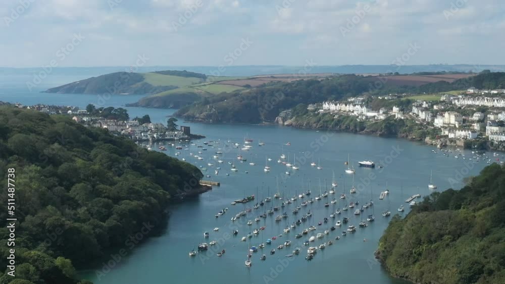 Aerial view over the River Fowey, In South Cornwall, UK looking towards the town of Fowey and Polruan towards the sea. Aerial view over the River Fowey, In South Cornwall, UK looking towards the town of Fowey and Polruan towards the sea.