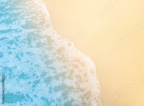 Wave bay beach with blue soft water, beautiful sandy beach and soft blue sea waves,blue sea water with brown sandy beach, Soft blue sea waves on a clean sandy beach © JOWO PARALON AS