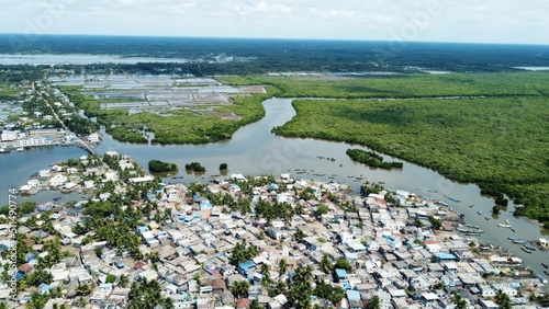 Amazing views from air shot by drone Pallam Island with perfect nature and buildings of village water green trees boats travel pictures best views houses streets roads river environment background 