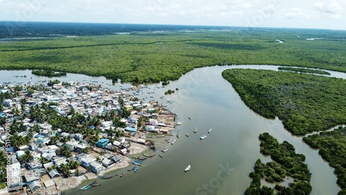 Amazing views from air shot by drone Pallam Island with perfect nature and buildings of village water green trees boats travel pictures best views houses streets roads river environment background 