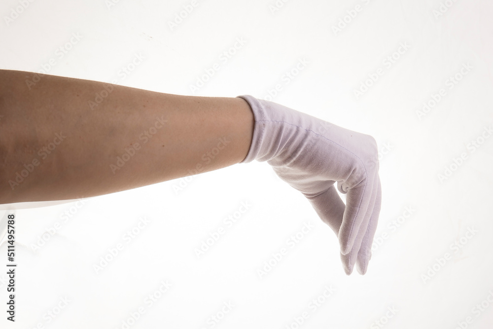 Hands gesticulating in white textile gloves on a white background Hands gesticulating in white textile gloves on a white background