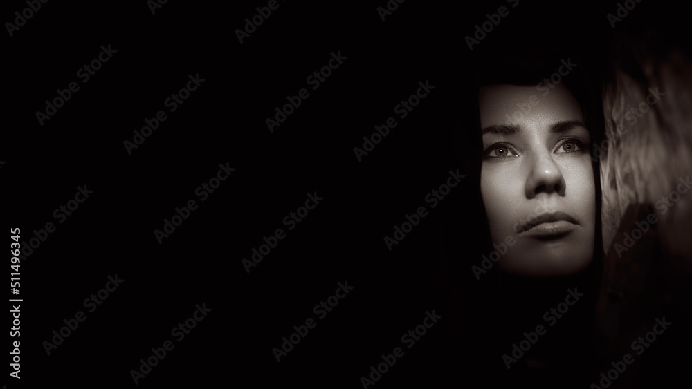 Portrait of a young woman in the shade close up Portrait of a young woman in the shade close up