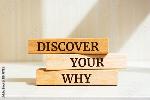 Fotobehang Wooden blocks with words 'Discover Your Why'.