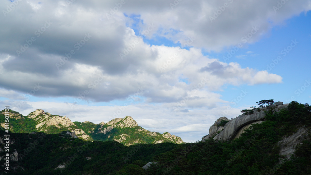 The grandeur of the mountain peaks and clouds of Bukhansan Mountain