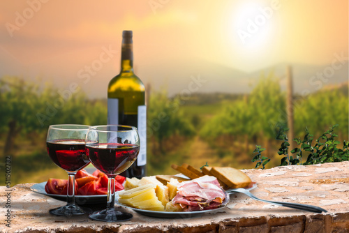 Fototapeta Naklejka Na Ścianę i Meble -  wine and cheese on a picnic
