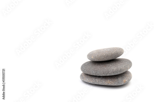 Zen stones on a light background. Minimalistic concept. Zen balance miditation concept. For branding and product presentation.