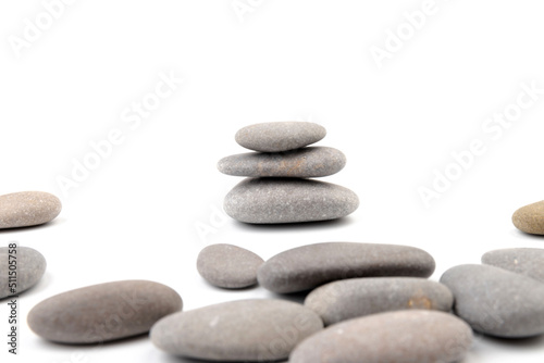 Zen stones on a light background. Minimalistic concept. Zen balance miditation concept. For branding and product presentation.