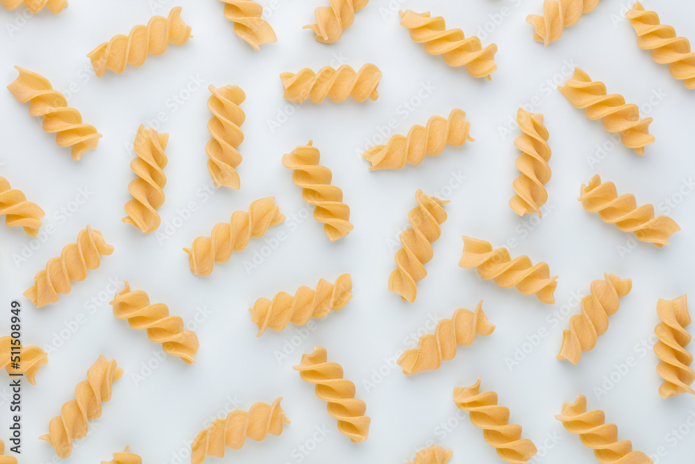 Pattern made of pasta on pastel background. Flat lay. Pattern made of pasta on pastel background. Flat lay.