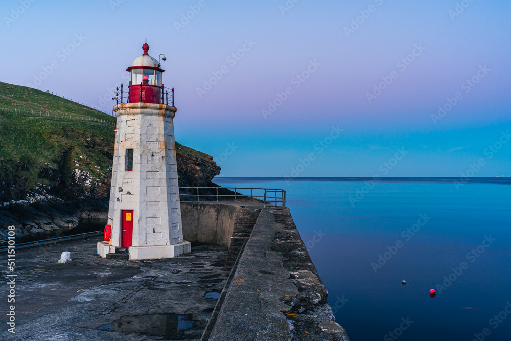 Blue Hour over Lybster Lighthouse and Harbour, East Coast of Scotland , UK
