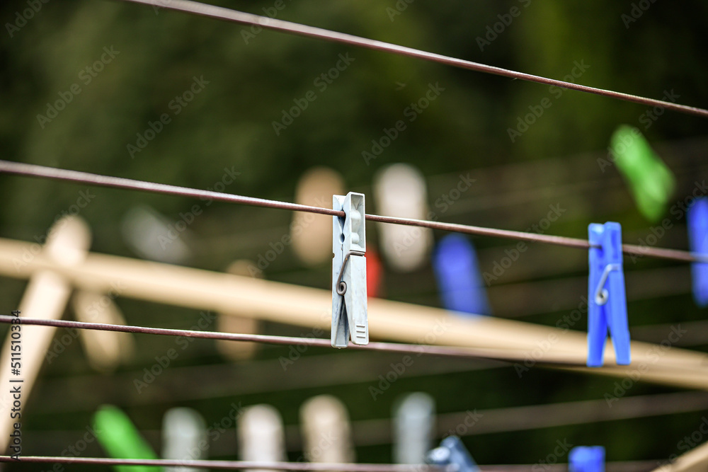 Blue clothespins for drying wet and washed clothes. Blue clothespins for drying wet and washed clothes.