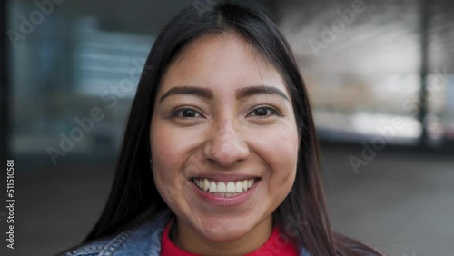 Happy native American young woman smiling in camera