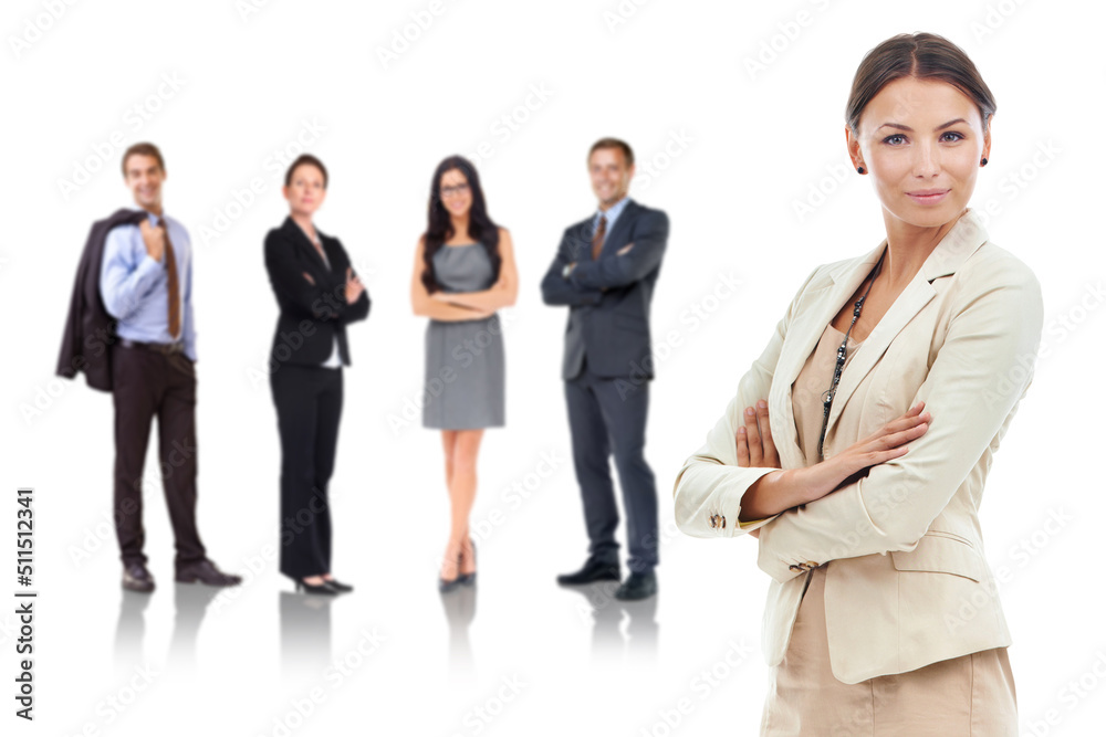 Were dressed for success. Studio shot of a successful businesswoman with her colleagues in the background. Were dressed for success. Studio shot of a successful businesswoman with her colleagues in the background.