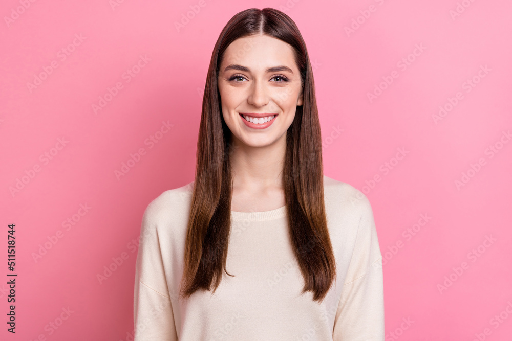 Fototapeta premium Portrait of attractive cheerful content brunet girl wearing casual sweater isolated over pink pastel color background