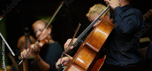 Symphony sounds. Cropped shot of musicians during an orchestral concert.