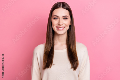 Portrait of attractive cheerful content brunet girl wearing casual sweater isolated over pink pastel color background