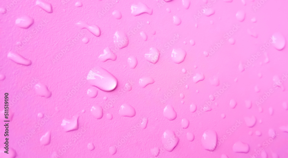 Abstract water drops on the pink wall. Suitable for promotion and advertising, website, tech industry and company, etc. Abstract water drops on the pink wall. Suitable for promotion and advertising, website, tech industry and company, etc.