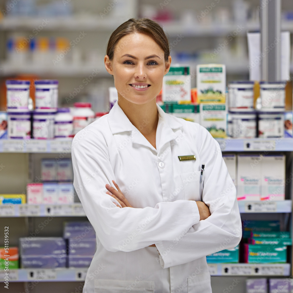 Ill do everything I can to help my customers. Portrait of an attractive young pharmacist standing at the prescription counter.