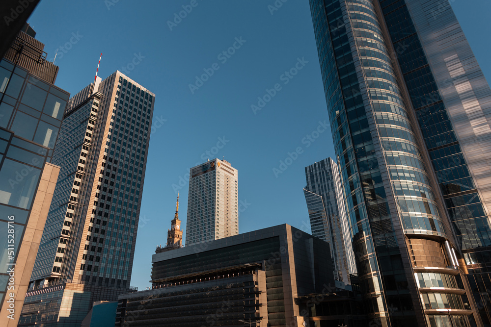 Poland, Warsaw. Downtown and sky city with modern glass business buildings Poland, Warsaw. Downtown and sky city with modern glass business buildings