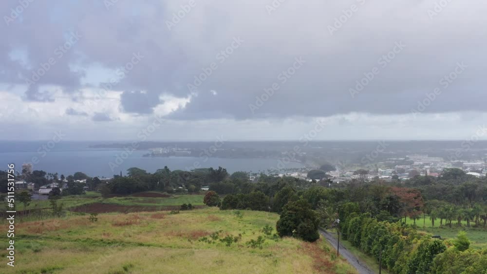 Rising aerial shot of downtown Hilo in the rain on the Big Island of Hawaii. 4K Rising aerial shot of downtown Hilo in the rain on the Big Island of Hawaii. 4K