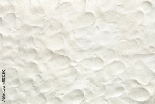 White plasticine texture with finger prints. Modeling clay material pattern background.