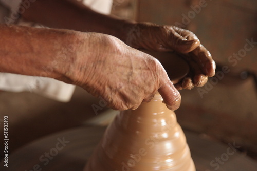 hands of a potter at work