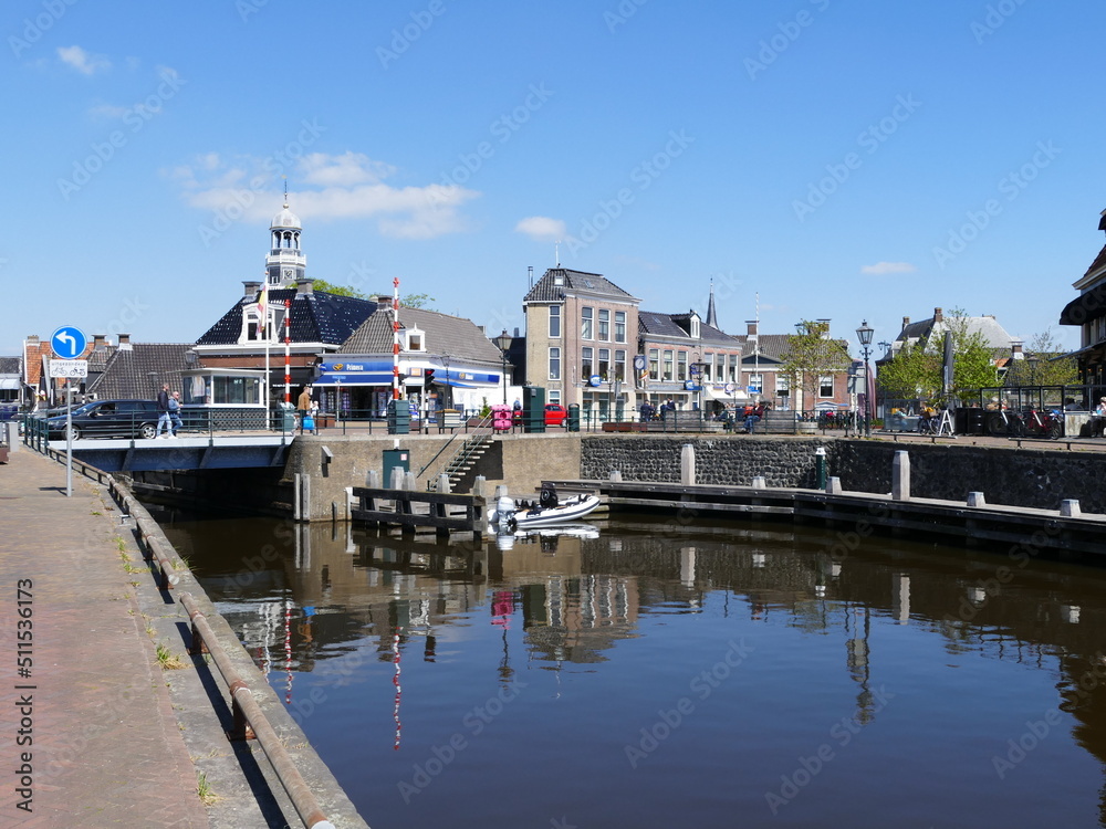 View towards the center of (Dutch) Lemmer (Frisian) De Lemmer (port town on the Ijsselmeer, a very big lake), Friesland, Netherlands, left a lift bridge