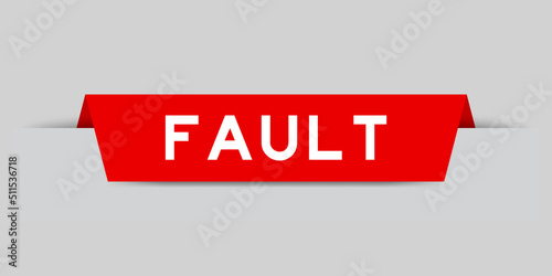 Red color inserted label with word fault on gray background