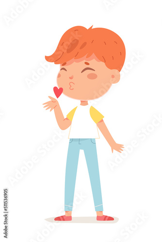 Cute boy in love sending air kiss, blowing with heart, child showing romantic feelings