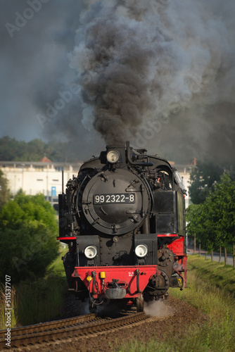 Fototapeta Naklejka Na Ścianę i Meble -  Vintage steam locomotive full steam ahead