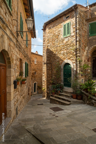 Fototapeta Naklejka Na Ścianę i Meble -  A stone alley in the town of Campiglia Marittima in Tuscany
