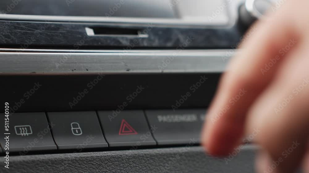 Press lock door button on car front panel. Safety first Press lock door button on car front panel. Safety first
