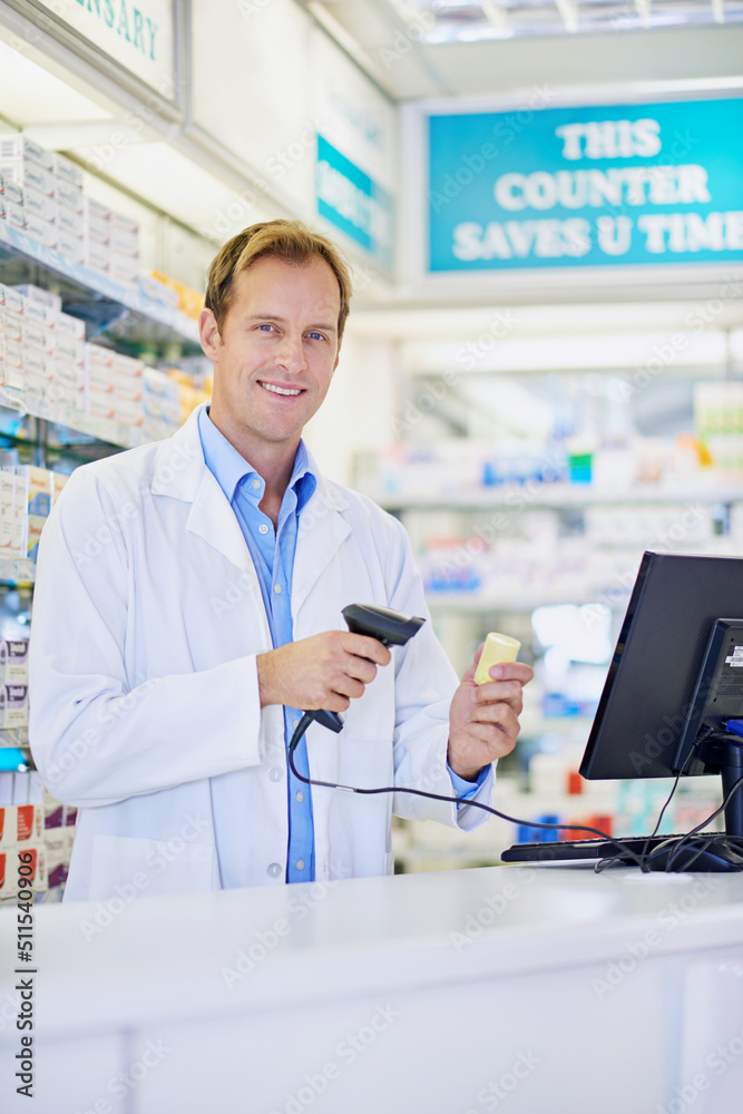 Technology makes everything easier. A pharmacist scanning the price on a bottle of pills. Technology makes everything easier. A pharmacist scanning the price on a bottle of pills.