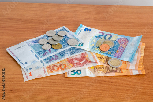 Croatian kuna coins and HRK hrvatska kuna (Croatian) banknotes and Euro banknotes and coins. photo