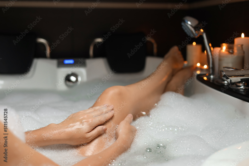 © New Africa - Beautiful woman taking bubble bath indoors, closeup. Romantic atmosphere © New Africa - Beautiful woman taking bubble bath indoors, closeup. Romantic atmosphere