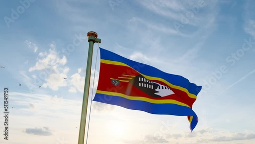 Flag of Eswatini waving in the wind, sky and sun background video.  Swaziland flag video. Realistic Animation, 4K UHD 25 FPS. 3D Animation photo