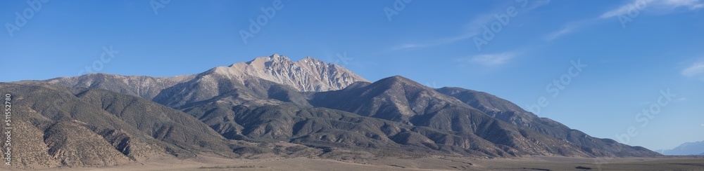 Desert Mountain Nature Landscape. Sunny Blue Sky. Nevada, United States of America. Nature Background. Panorama Desert Mountain Nature Landscape. Sunny Blue Sky. Nevada, United States of America. Nature Background. Panorama