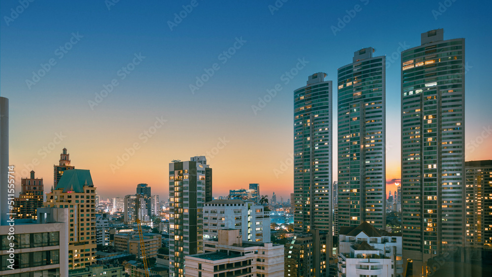 Scenery view night cityscape at sunset with skyscraper in Bangkok, Thailand.